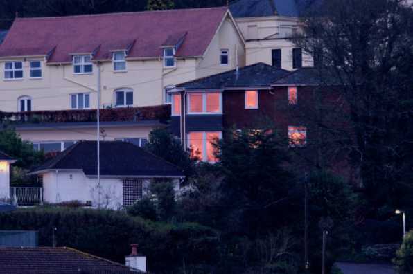 24 February 2020 - 17-53-34
Strange light. And I still don't know for certain if this house atop Kingswear was reflecting a sunset. If it was, no other house was. My only other alternative.....film lights inside.